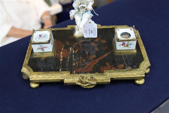 A Continental ormolu and porcelain mounted ink stand, 18th century and later, 32cm wide